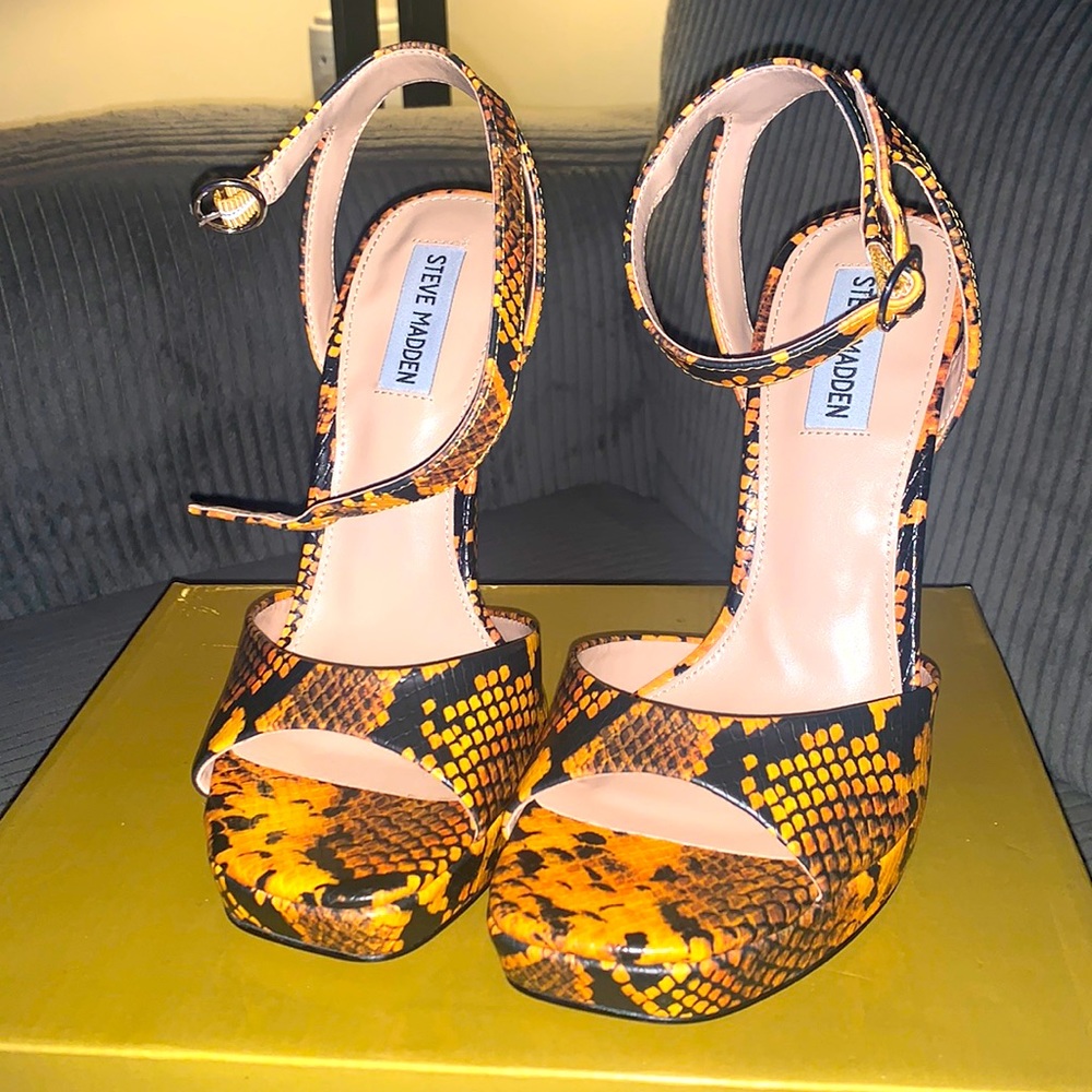 Orange and. Black pumps by Steve Madden